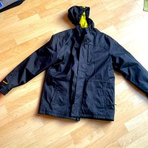 Youth XL boys Under Armour boys jacket. Black with bright yellow liner